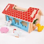 Imagen de Casa Granja de encastre y clasificación en madera Bigjigs